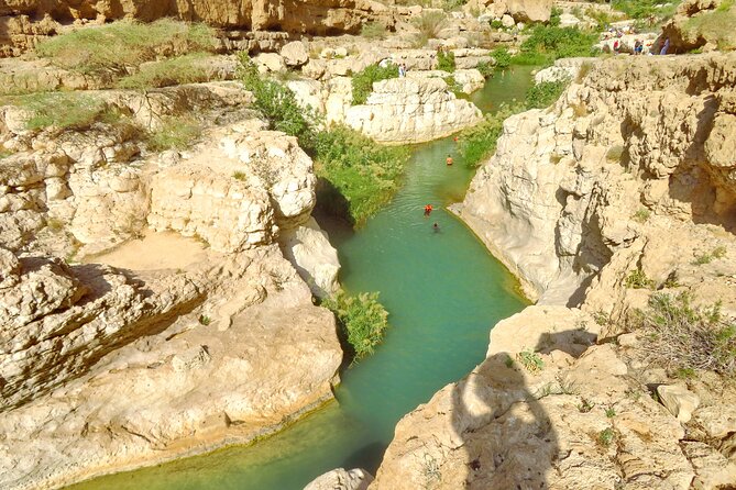 2 Day Private Trip to Two Oasis with Overnight Desert Camping - Qalhat adds an important historical pause