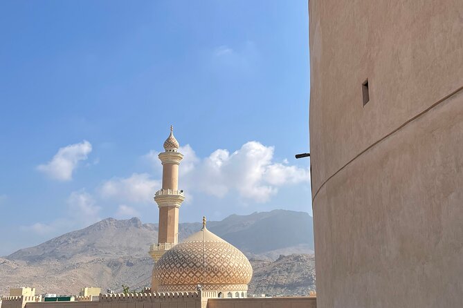 AMOUAGE: Full Day Private Tour to Nizwa and Jebel Akhdar - Nizwa Souq: Dates, Spices, Silver, and Daily Trade