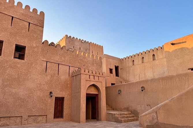 Amouage & Nizwa Full-Day Tour: Fort, Souq & Barakat Al Mouz - Barakat Al Mouz: palms, water, and mountain quiet
