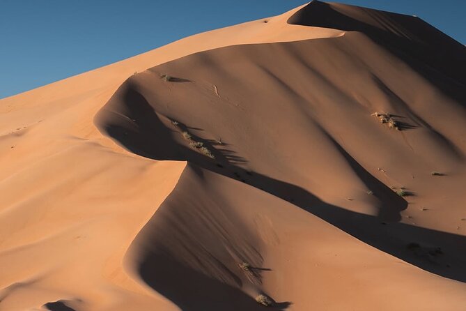 desert overnight tour in salalah - Sunset on the dunes at the right time of day