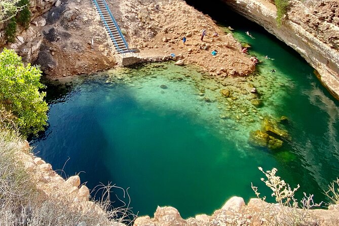Discover Wadi Shab by a Professional Omani Guide (private). - Bimmah White Beach adds a quieter pause