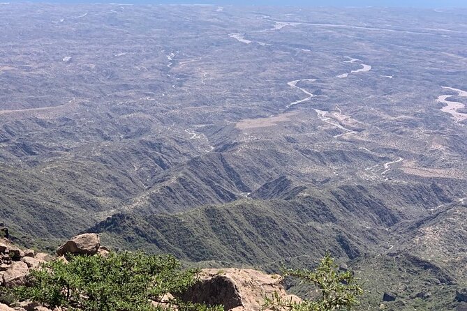 East of Salalah, Mountain Safari, Camels, Waterfall, White beach - A long day that connects coast, mountains, and wadis