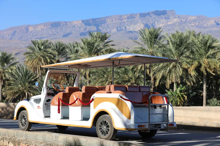 From Al Hamra: Al Hamra Electric Cart Tour - Arriving at Al Hamra Heritage Village