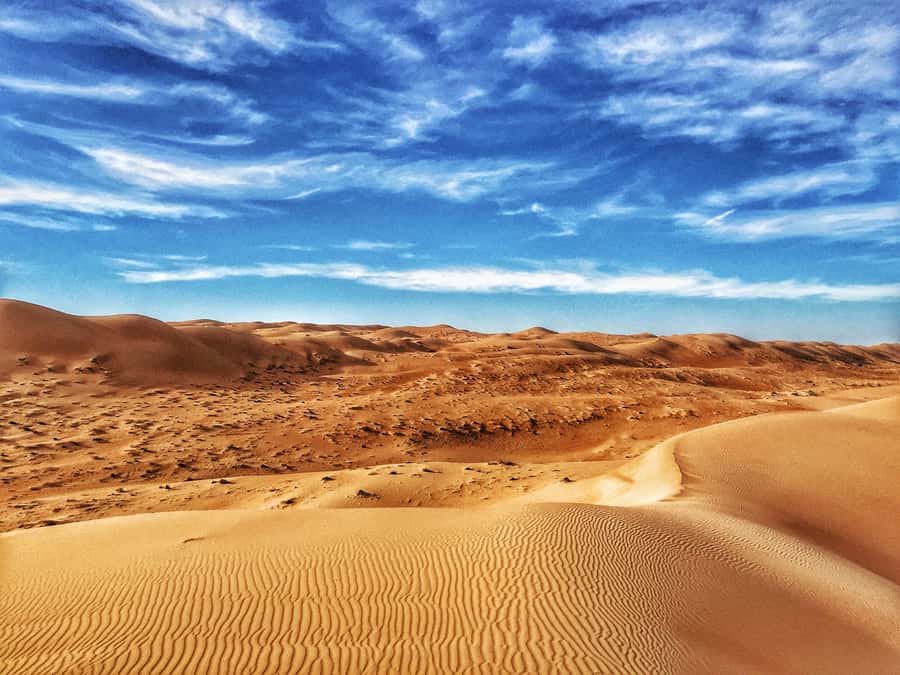 From Muscat: Desert Overnight and Wadi Bani Khalid - Sunset, dinner, and your night at camp