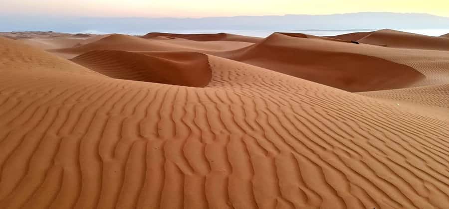 From Muscat: Full Day to Wahiba Sands and Wadi Bani Khalid - From clear pools to golden dunes