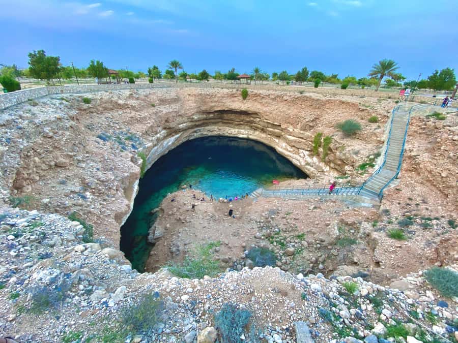 From Muscat: Wadi Shab & Bimmah Sinkhole Full-Day Tour - Swimming through Wadi Shab’s blue pools