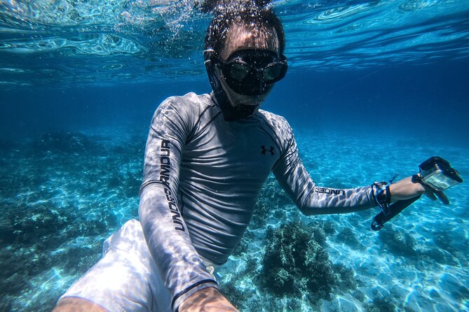 Full day Dhow: Khasab, Musandam: Dolphins, Snorkeling & Fjords - Snorkeling, swimming, and kayaking in clear water