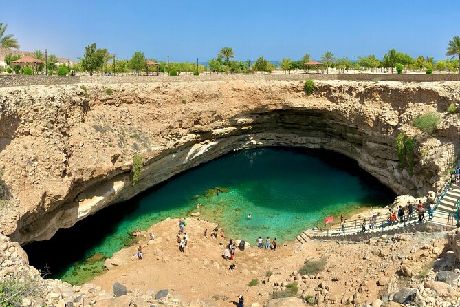 Full-Day Private Guided Wadi Shab and Bimmah Sink Hole Tour - Lunch with a traditional Omani meal