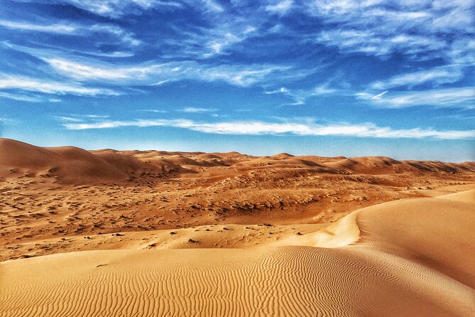 Full-Day Wahiba Desert and Wadi Bani Khalid Group Tour - The long road east from Muscat
