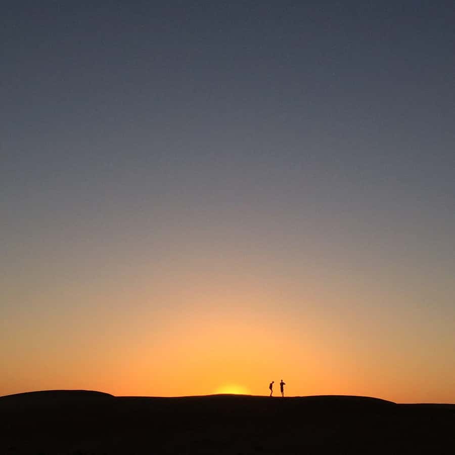 Muscat: Bidiya Desert Sunset Camel Ride with Transfer - Sunset is the main event