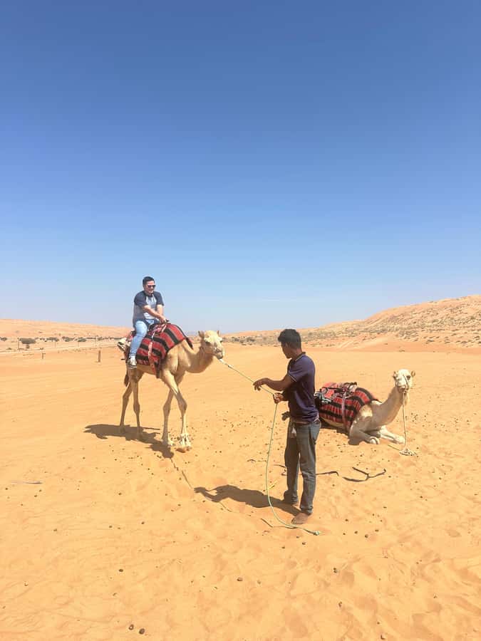 Muscat: Bidiya Desert Sunset Camel Ride with Transfer - Guides make or break the experience