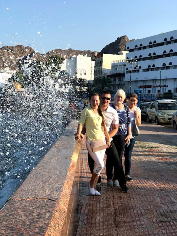 Muscat: Day Tour with Omani Lunch, Hotel Pickup, and Airfare - Qurum Beach, lunch, and a short coastal pause