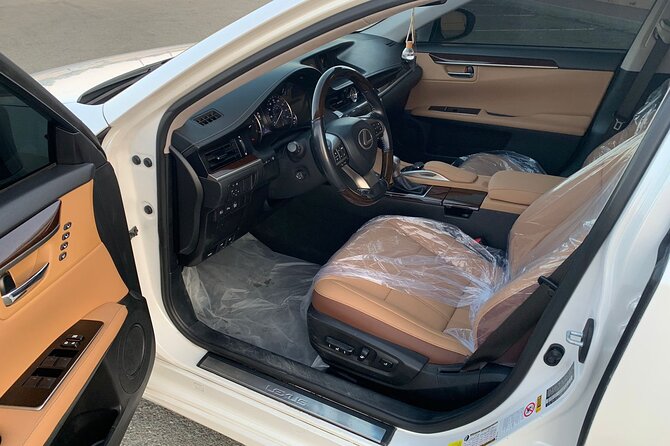 Muscat : Luxury car with private driver - Comfort, water, and the luxury-car promise