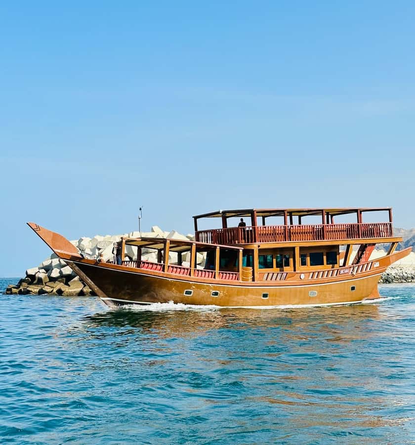 Muscat: Omani Dhow Coastal and Sunset Cruise - The coastal route, from Al Bustan Palace to the royal quarter