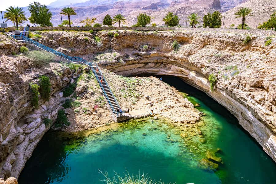 Muscat: Southern Treasures & Wadi Shab Tour with Audio Guide - Swimming through Wadi Shab’s clear pools