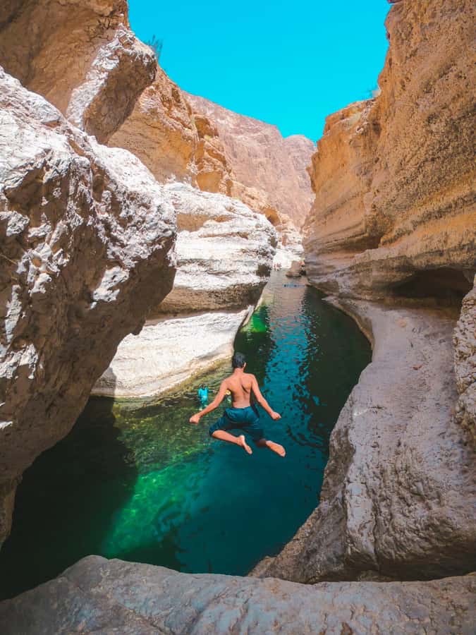Muscat: Wadi Shab & Bimmah Sinkhole Tour with Pickup & Lunch - The Muscat pickup and the road south