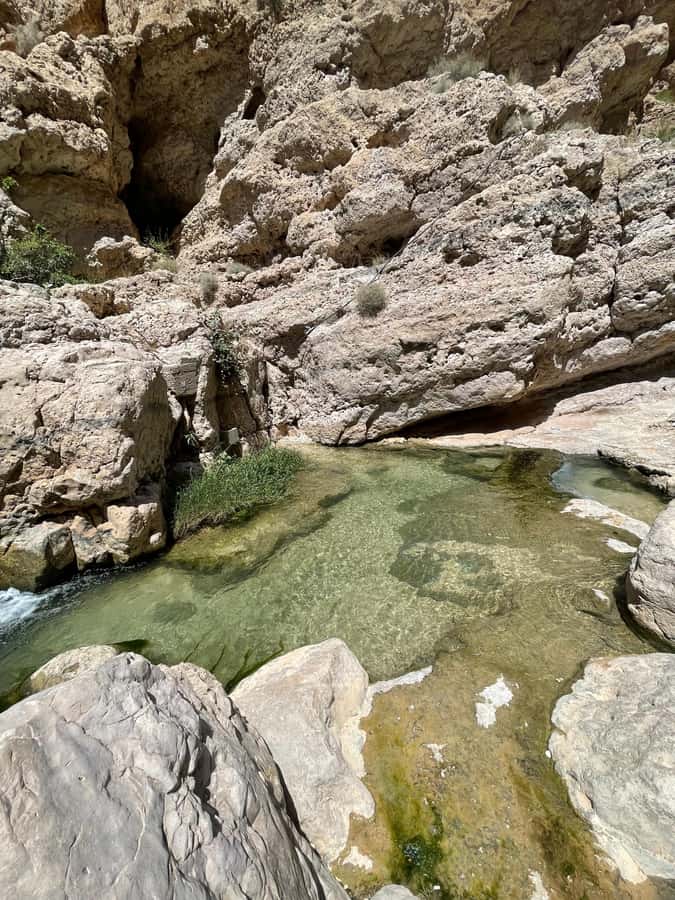 Muscat: Wadi Shab, Romantic Cave and Sinkhole Full-day Trip - Reaching the clear pools and cave waterfall