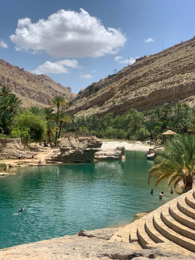 Oman: Wahiba Desert Sunset & Wadi Bani khalid Full Day+Lunch - Exploring Mukal Cave and the wadi area