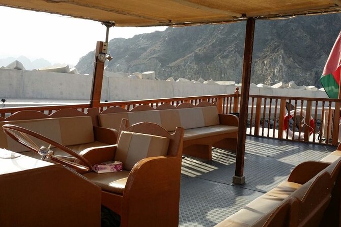 Omani Traditional Dhow Cruise: Sunset and Muscat Coastal View - Al Jalali Fort above the harbor