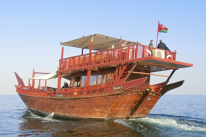 Omani Traditional Dhow Cruise: Sunset and Muscat Coastal View - Coffee, dates, and light refreshments