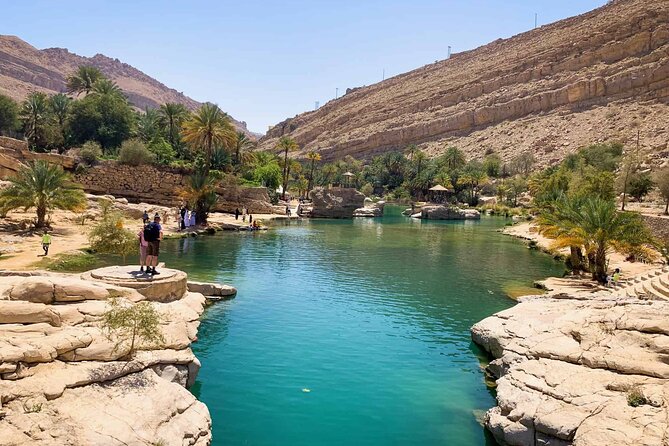 Private 2 Days Arabian Desert with Over Night Tour - Wadi Bani Khalid: pools, white rock, and a short walk