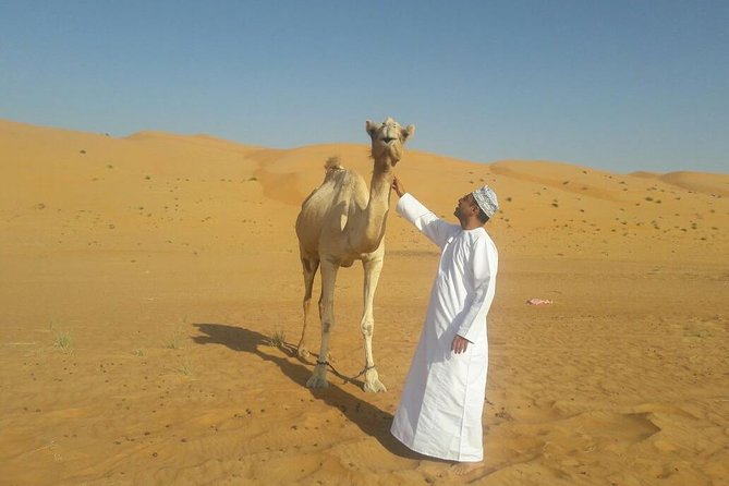 Private Day Trip to Grand Mosque & Wahiba Sands - Who should book this experience?