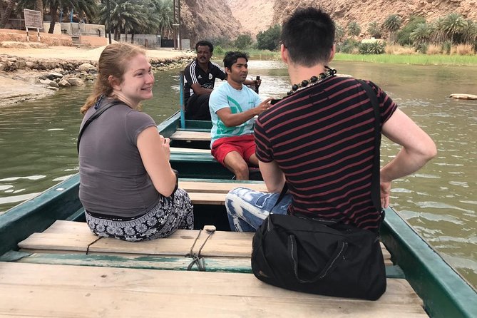 Private Day Trip to Wadi Shab, Fins Beach & Bimmah Sinkhole - Entering Wadi Shab by boat and foot