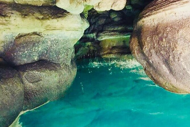 Private Full-Day Wadi Shab and Bimmah Sinkhole Tour - Swimming Into the Cave