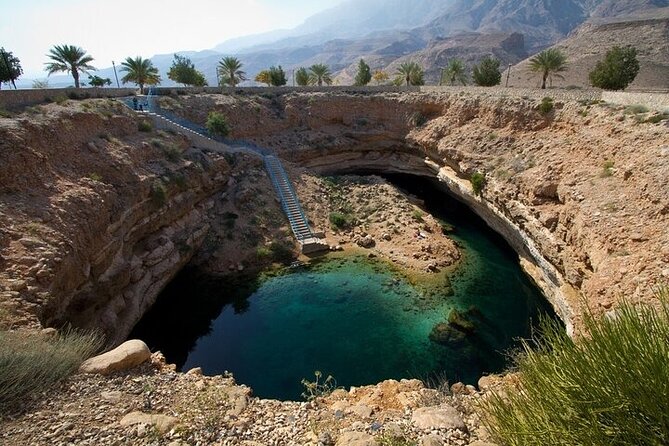 Private Full- Day Wadi Shab-Bimmah Sinkhole-Fins Beach Tour - Fins Beach: a short pause beside blue water