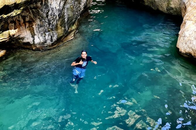 Private Full-Day Wadi Tiwi and Bimmah Sinkhole Tour from Muscat - Fins Beach brings the day back to the sea