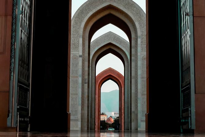Private Half-Day Muscat City At Night Tour - What the guide adds to the experience