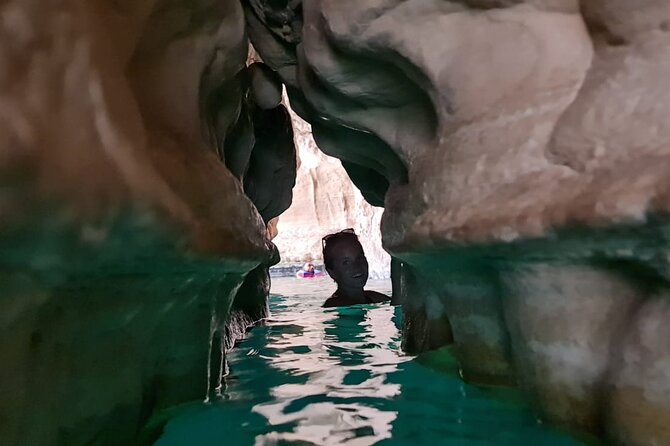Private Tour Wadi Shab & Sinkhole Tour – Swim, Hike & Explore - The boat crossing and hike into Wadi Shab