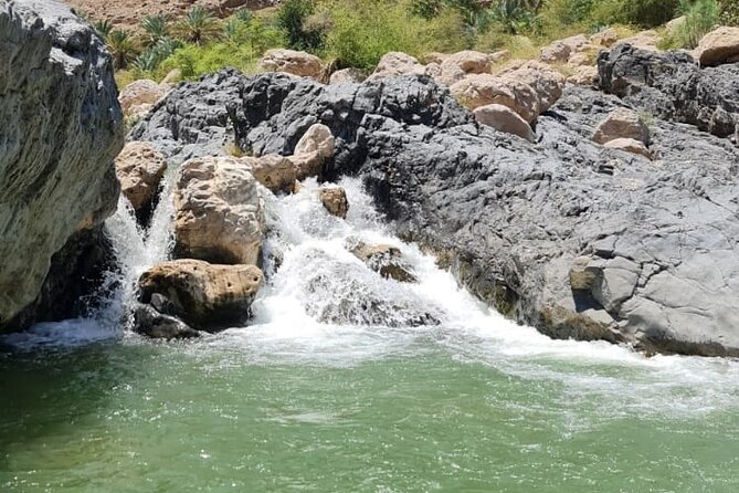 Private Wadi Arbyeen - Sinkhole - White Sand Beach- Full Day Tour - Fins Beach brings a long stretch of white sand