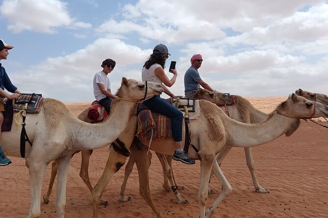 Sharing Tour to Wahiba Sand Desert and Wadi Bani Khalid Full Day - Coffee, dates, camels, and desert customs