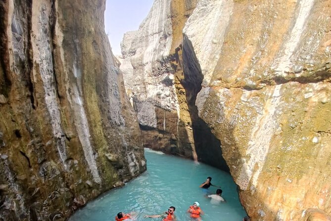 Wadi Alhoqain Thrill Seeker's Oasis - Blue Lake and the waterfall scene