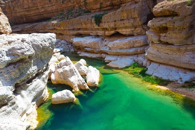 Wadi Shab and Bimmah Sinkhole Group Full Day Tour - The long approach to Wadi Shab