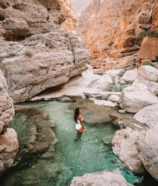 wadi shab and bimmah sinkhole tour from muscat - Cliff jumping with choices for beginners