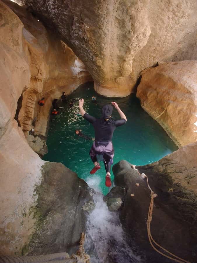 Wadi Shab Parking Meet the Local Guide for Self drivers - The five-minute boat ride across the river