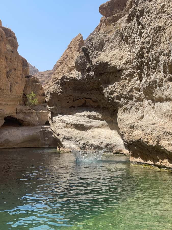 Wadi Shab Parking Meet the Local Guide for Self drivers - Reaching the hidden cave waterfall