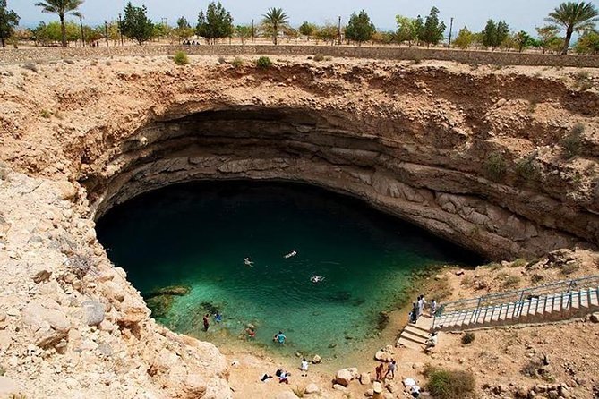 Wadishab and Bhima Sink Hole (Sharing Tours - Bimmah Sinkhole: turquoise water beside the coast